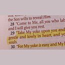 Highlighted text on a page shows a verse in the Bible