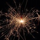 Black background with bursting fireworks