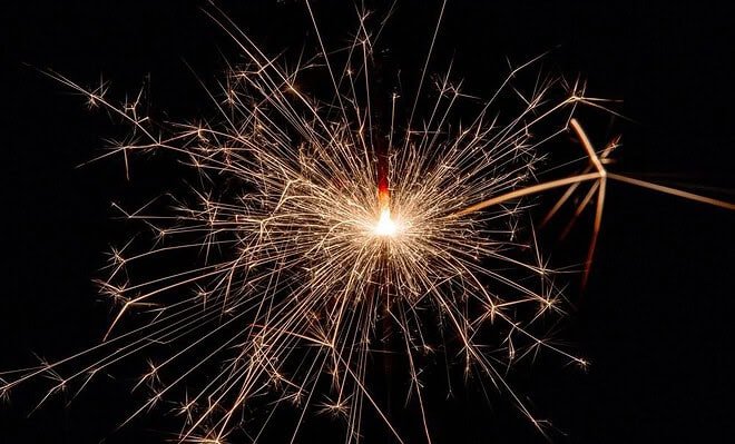 Black background with bursting fireworks
