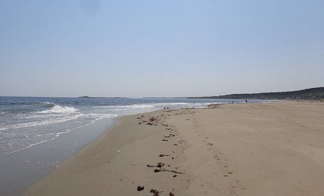 Image of footprints in the sand along Popham Beach, Maine