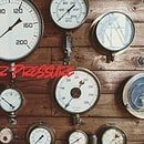 An assortment of gauges displayed on a wall