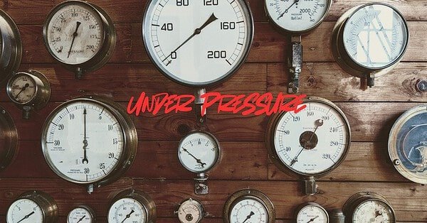 An assortment of gauges displayed on a wall
